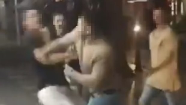 Police will allege one of the men charged over the assault had been banned from the Safe Night Precinct.