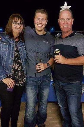 Senior Constable David Masters with wife Sharon and son Jack.