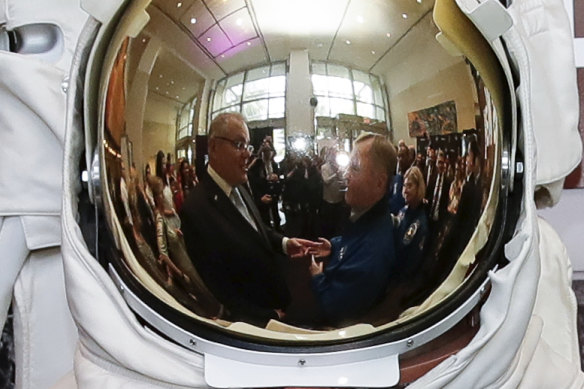 Prime Minister Scott Morrison, Australian astronaut Andy Thomas and astronaut Pam Melroy after the signing of a letter of intent on expanding cooperation in space exploration, at the NASA headquarters in Washington DC.
