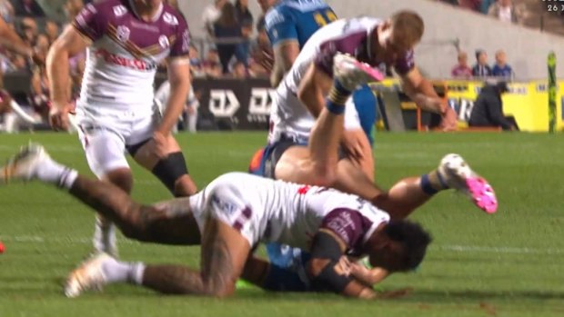 Shaun Lane is tackled by Haumole Olakau’atu and Daly Cherry-Evans.