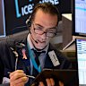 A trader works on the floor of the New York Stock Exchange.