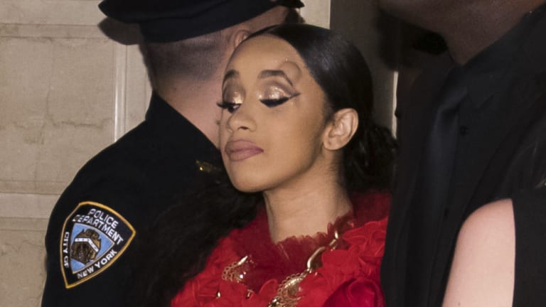 Cardi B, with a lump on his forehead, leaves the evening of New York Fashion Week after the altercation. 