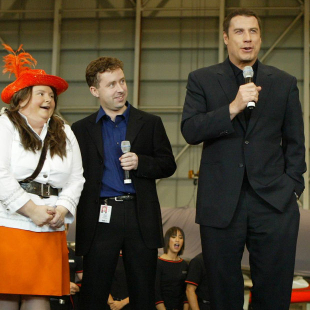 Entertainer Magda Szubanski, then Jetstar CEO Alan Joyce and actor John Travolta at the airline's launch.