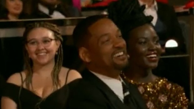 Moments before taking to the stage, Will Smith seemed to enjoy Rock’s banter. 