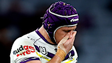 Harry Grant leaves the field. 
