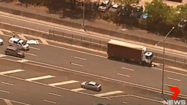 A woman died after she was struck by a truck on the Ipswich Motorway on Friday morning.