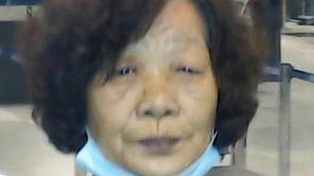 Police say 72-year-old Mingzhen Liu is also wanted over the fraud.