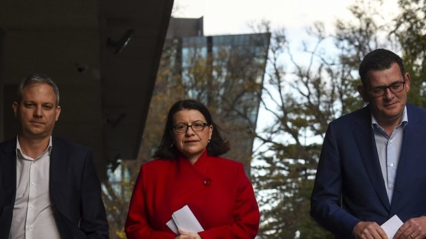 Victorian Chief Health Officer Brett Sutton, Health Minister Jenny Mikakos and Victorian Premier Dan Andrews (pictured from left to right) in June.
