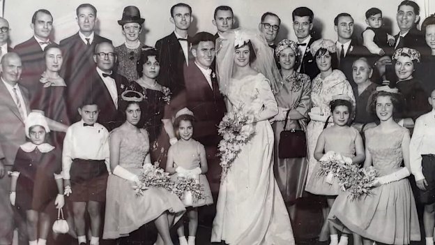 A photo from the wedding of Peter and Stella Samios (centre). They married just six months after they first met.