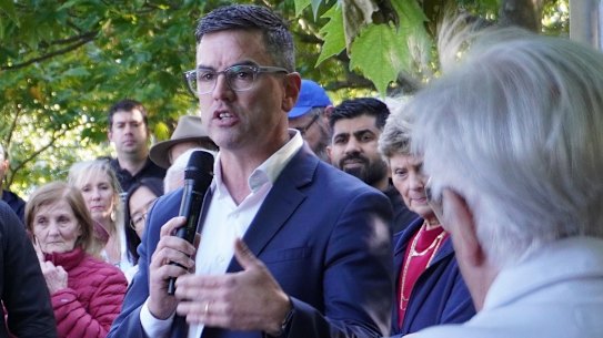 Liberal MP Brad Battin speaking on Tuesday at a protest over renaming a lake in Berwick.