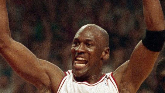 Michael Jordan celebrates the Bulls win over the Portland Trail Blazers in the NBA Finals in Chicago.