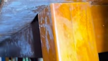 Dining table covered in mould after drying washing inside