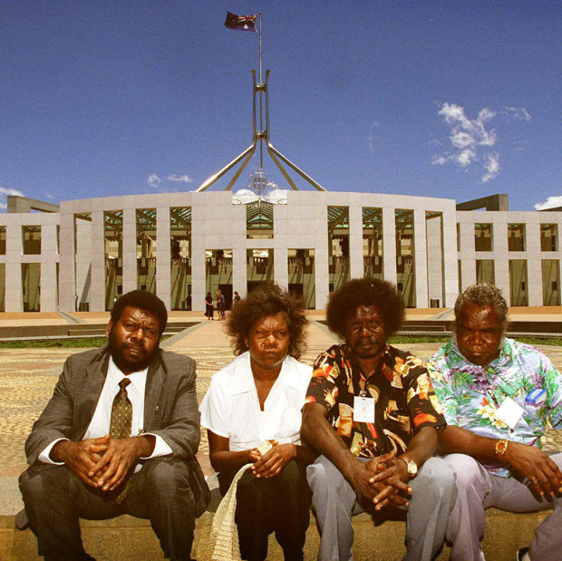 The son of Eddie Mabo, Eddie Mobo jnr.(left) with Wik people from Cape York Peninsula Norma Chevathun (2nd left) Jonathan Korkaktain (2 right) and Doug Woolah (far right).
