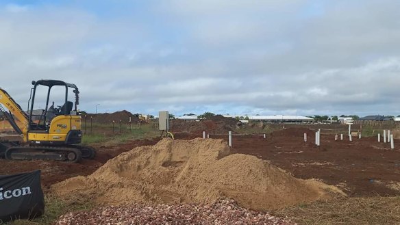 Kim James put down a deposit in July 2021 to build with Metricon on her block in Bundaberg, Queensland, but says the slab is yet to be poured. 