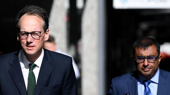 Australian Securities & Investments Commission chairman James Shipton (left) and the regulator's chief legal officer Chris Savundra. 