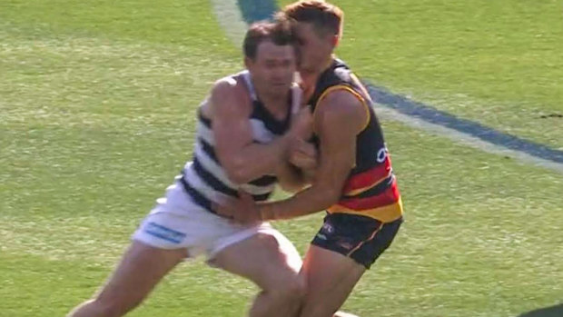 Geelong’s Patrick Dangerfield was banned for this bump on Adelaide’s Jake Kelly.