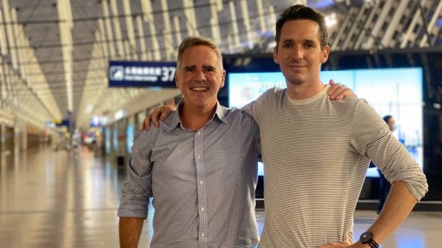 AFR journalist Mike Smith with ABC journalist Bill Birtles as they prepared to leave China on Monday night.