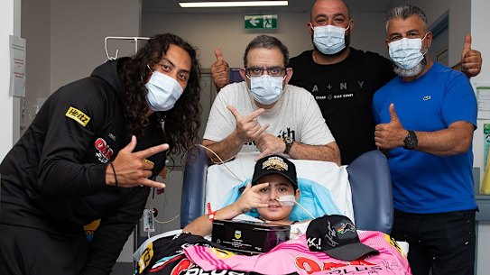 Jarome Luai with Nicholas Tadros and his family in February.