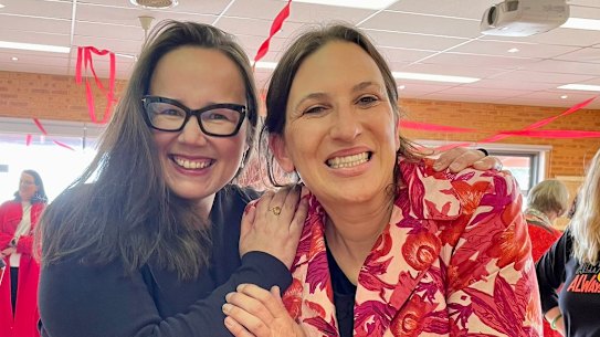 Labor’s Jordan Crugnale (right) and ALP MP Harriet Shing pose together in an image posted to social media by Shing after Crugnale claimed victory in the seat of Bass.