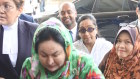 Rosmah Mansor walking slowly into Kuala Lumpur's High Court on Wednesday.