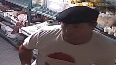 A security camera still from footage of "two grubs" who broke into Italian restaurant Beccofino at Teneriffe and stole cheese, salami, other meats, pasta and alcohol.