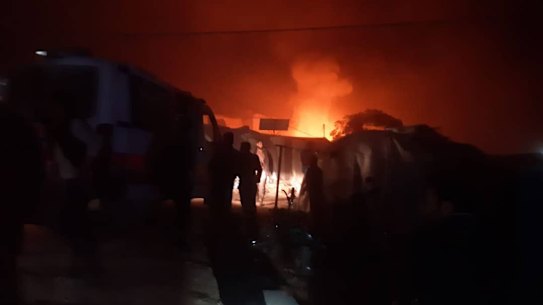 A photo posted by the White Helmets' Facebook page of the air strikes on Qah camp near the Turkish border in Idlib.