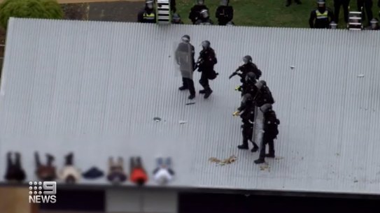 The last of the detainees are forced off the roof at Banksia Hill Detenion Centre following a 14-hour stand-off. 