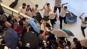 Men wearing white shirts have been filmed attacking protesters in Hong Kong. Vision on social media shows men wielding rods and beating demonstrators at Yuen Long MTR station. 