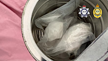 A couple will face court after suspected ketamine was allegedly found hidden in a baby formula tin at their home, where two young children lived.