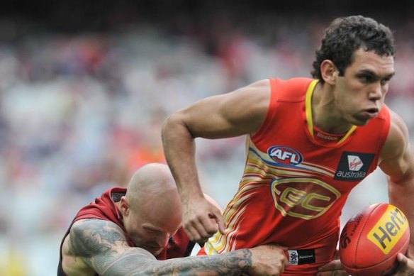 Harley Bennell, right, in action for the Suns. 