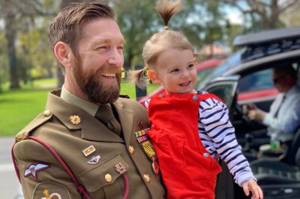 Dusty Miller and his daughter, Eliza. Dusty has had trouble shaking the memory of events in Afghanistan.