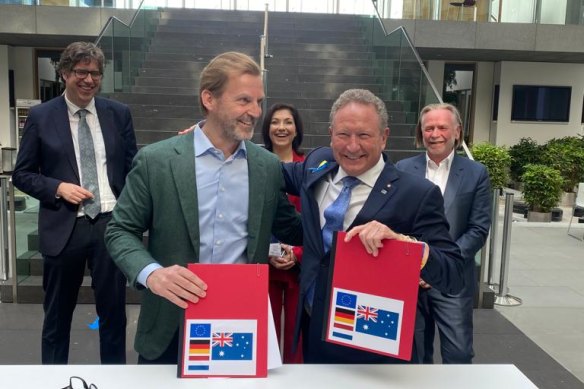 E.ON chief operating officer Patrick Lammers signs the hydrogen deal in Berlin with Fortescue boss Andrew Forrest.