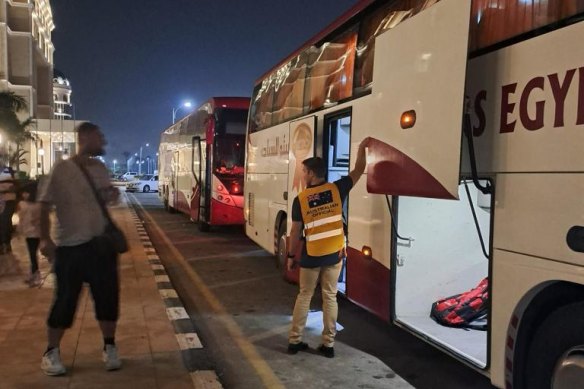 A bus waiting to take Australians from the border of the Gaza Strip and Egypt to Cairo.
