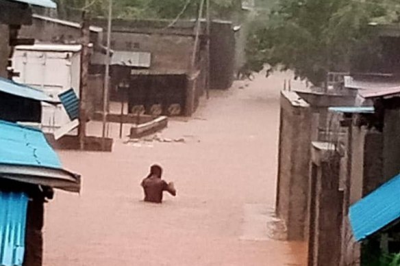 Rising waters in Dili on Sunday.