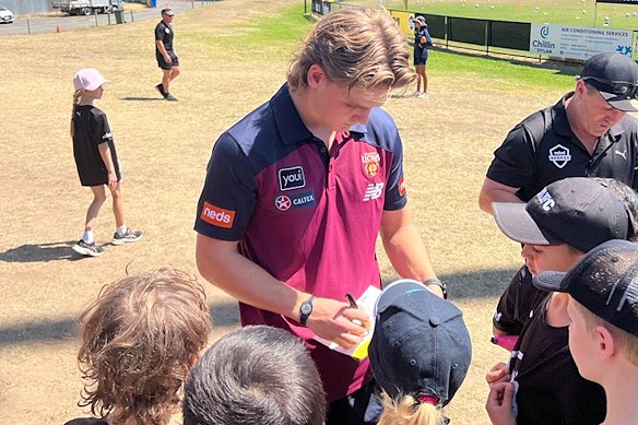 Lions rookie Ashcroft signs autographs at the Rebel Rookies clinic.