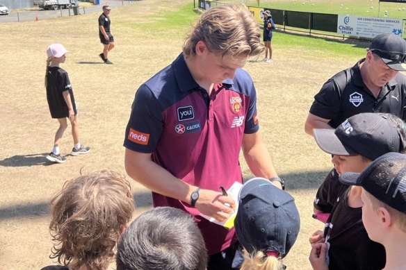 Lions rookie Ashcroft signs autographs at the Rebel Rookies clinic.