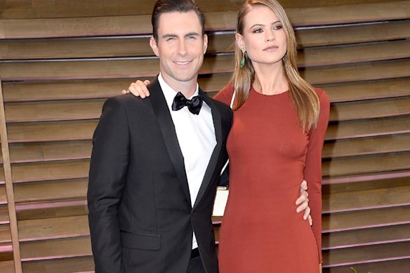 WEST HOLLYWOOD, CA - MARCH 02:  Musician Adam Levine (L) and model Behati Prinsloo attends the 2014 Vanity Fair Oscar Party hosted by Graydon Carter on March 2, 2014 in West Hollywood, California.  (Photo by Pascal Le Segretain/Getty Images)