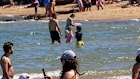 Beachgoers and their cabanas at the Half Moon Bay. 7 January 2026. Photo: Eddie Jim.

Heat, hot, weather, summer, beach, generic, bayside

Beach