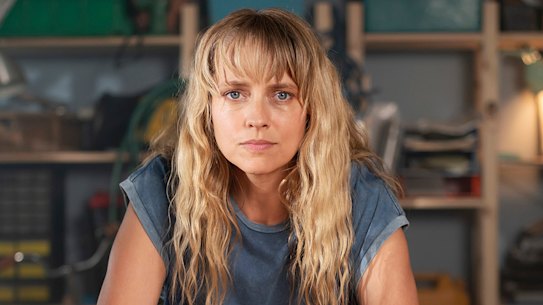 Teresa Palmer as Isabelle, an outsider who disrupts a previously quiet neighbourhood, in The Family Next Door