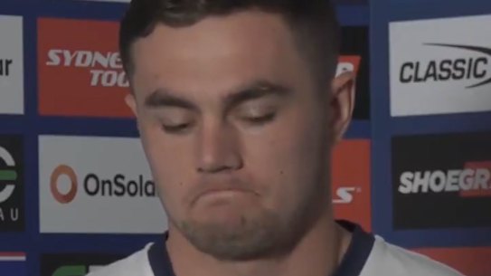 Kyle Flanagan breaks down during a press conference.