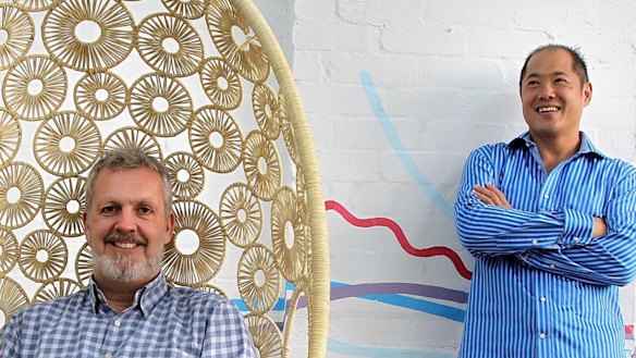 Google maps co-founder Lars Rasmussen (left) who backed Canva in its early days and investor Bill Tai in 2014 in Canva's offices. 