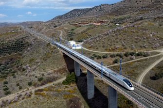 Taking the high-speed AVE train between Madrid and Seville.