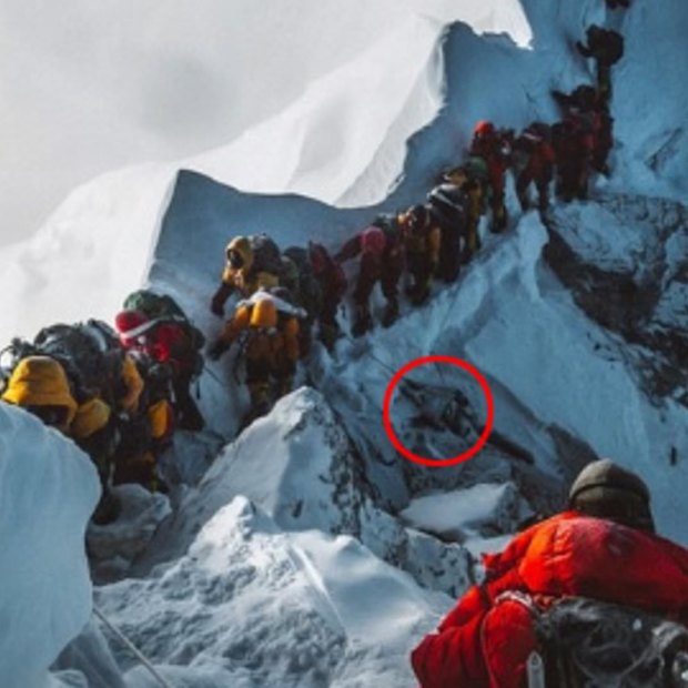 Everest climbers pass a dead body (circled) in May.