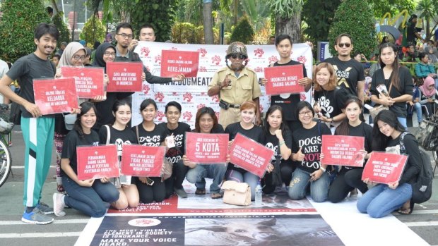 Members of the Dog Meat-Free Indonesia coalition protest against the killing of dogs for meat in their country.