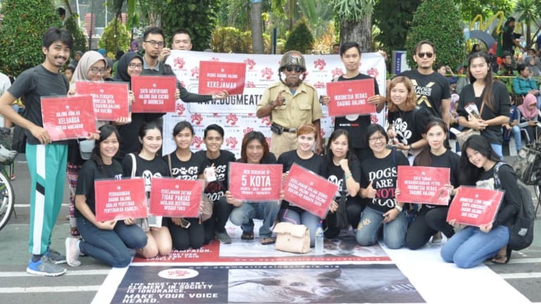 Members of the Dog-Meat Free Indonesia coalition protest against the killing of dogs for meat in their country.