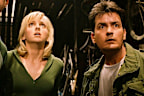 Anna Faris (centre) worked alongside Charlie Sheen (right) and Simon Rex (left) in Scary Movie 3 in the early noughties.