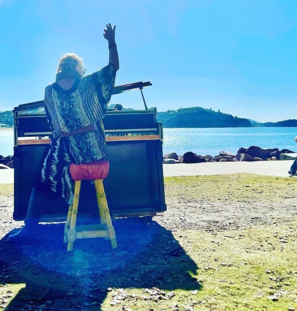 Pianos for the People founder Yantra de Vilder tickles the ivories at Avoca Beach.
