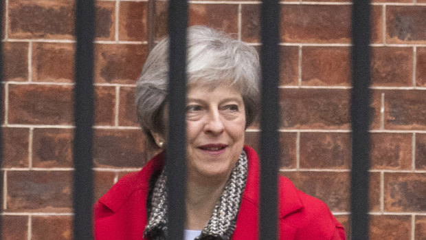 Britain's Prime Minister Theresa May leaves Downing Street in London on Friday.
