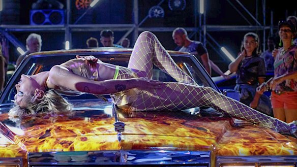 A car showroom model (Agathe Rousselle) takes sex in a new direction in Julia Ducournau’s Titane.