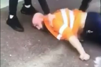 Anthony Mokbel lies unconscious on the ground after a brutal assault.
